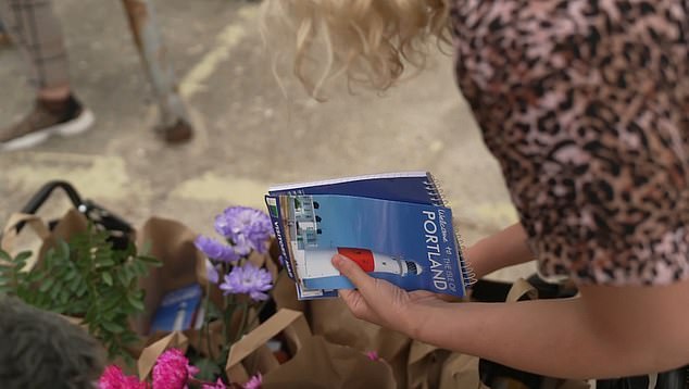 Campaigners attempted to give goodie bags containing flowers, shampoo and maps of Portland to the asylum seekers