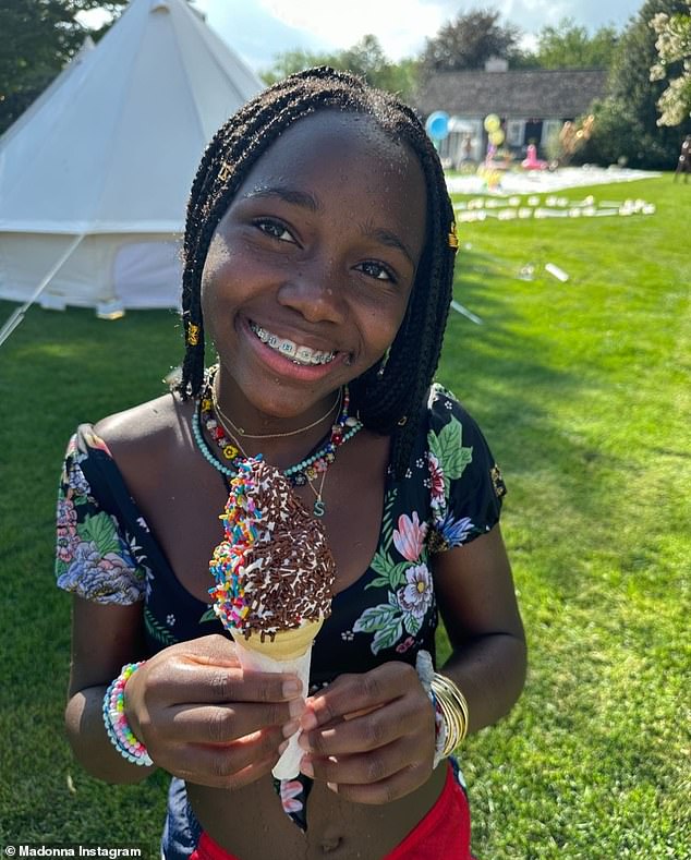 Fun in the sun: The 65-year-old performer spent time with twins Estere and Stella - who turned 11 last week