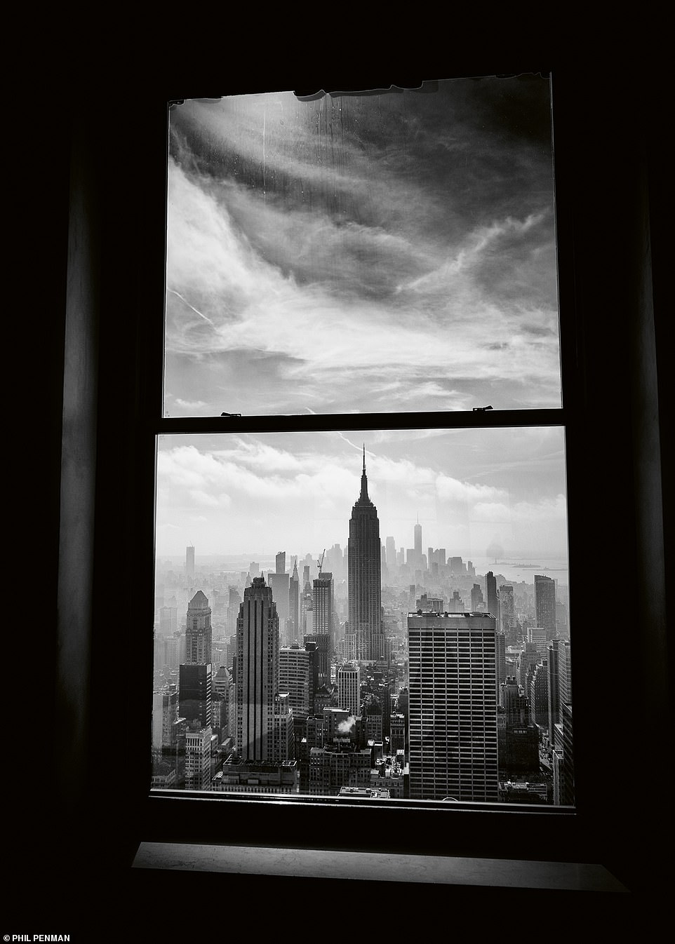 A series of stunning images showcase the big Apple in all its glory with portraits illustrating New York's style including this breathtaking view from Top of the Rock showing the Empire State Building