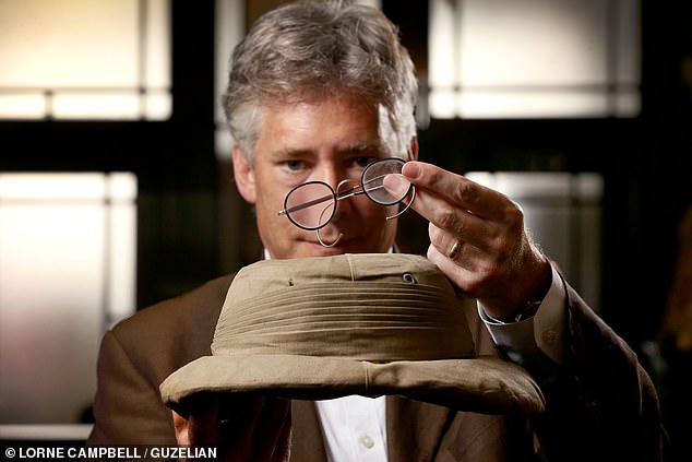 The Egyptomania expedition also displayed Ogden's pith helmet and glasses. Above: Being held by Robert Ogden