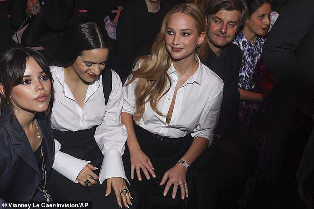 Jenna Ortega, from left, Rosalia, and Jennifer Lawrence attend the Christian Dior Spring/Summer 2024 womenswear collection on September 26 in Paris