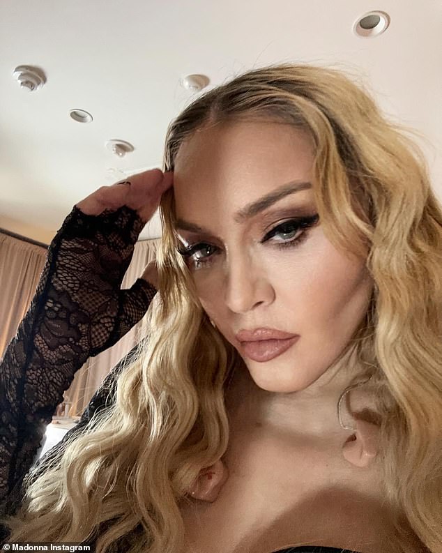 Selfie star: The Queen Of Pop put her incredibly stunning complexion on show