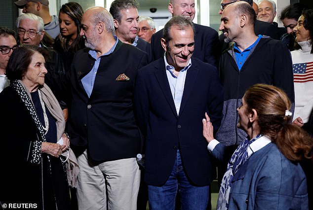 U.S officials arranged a group photo after freed Americans Siamak Namazi, Morad Tahbaz and Emad Shargi arrived back in the US last month