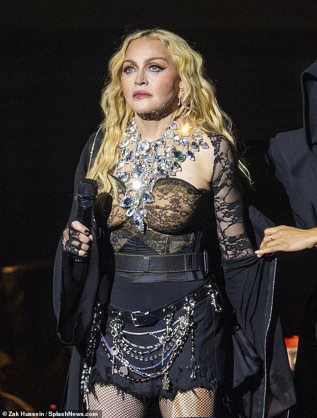 Heartfelt: Madonna has professed that she was 'saved' by her children as she spoke on stage at London's O2 during the opening weekend of her Celebration tour