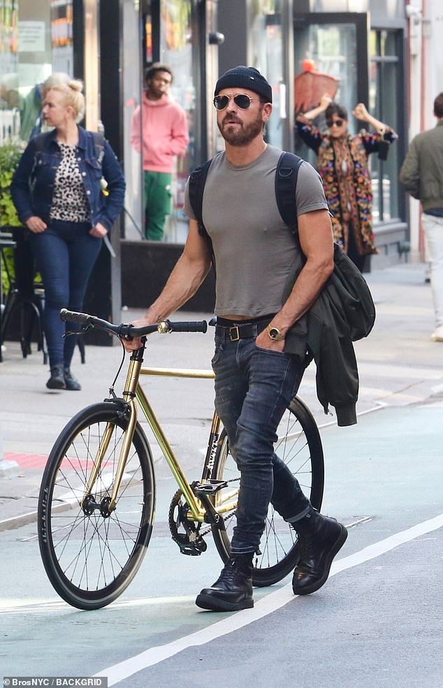 Cool cat: Theroux, 52, looked to be all showered and cleaned up dressed in fitted blue jeans, a tight gray t-shirt and black combat-style boots