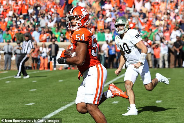 Clemson Tigers linebacker Jeremiah Trotter Jr. (54) scores a touchdown from an interception