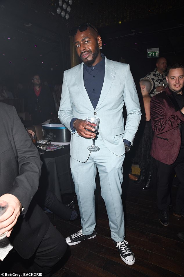 Smart: Vanessa Feltz's ex Ben Ofoedu looked dapper in a baby blue blazer and matching trousers which he wore with a navy shirt