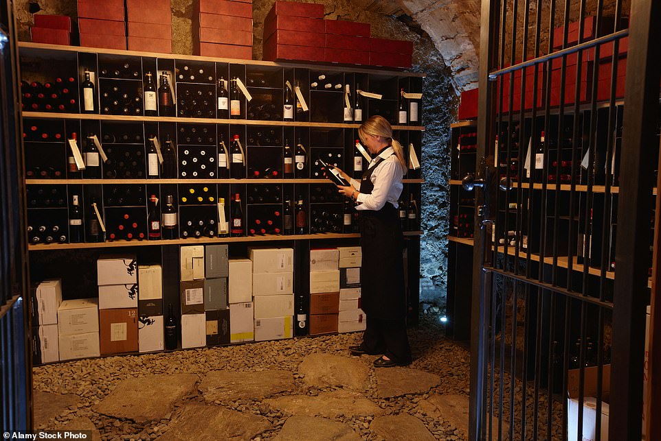 A spiral staircase down to a high-tech cellar big enough to stash a couple of thousand bottles at a constant temperature is all the rage. Read the full story: https://www.dailymail.co.uk/femail/article-12745629/The-kitchen-trends-turn-friends-green-envy.html?ito=msngallery