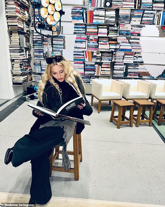 Bookworm: She shared a snap of herself catching up on reading while surrounded by books