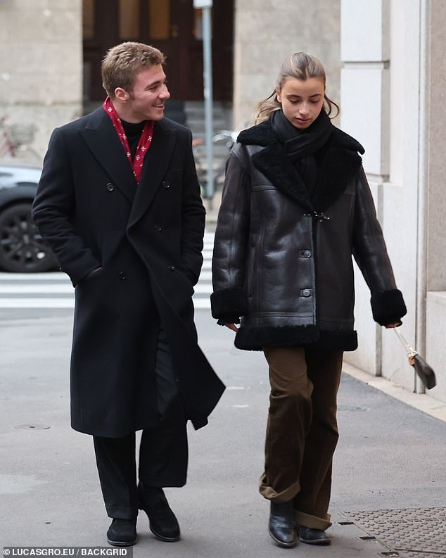 And the socialite seemed to be happier than ever as he enjoyed a winters stroll around the Italian city with Olivia