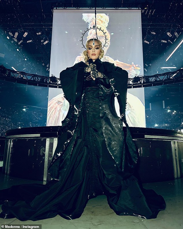 Madonna has revealed she was put in an induced coma for 48 hours while she was hospitalised with a bacterial infection (pictured at her Washington DC show on Monday)