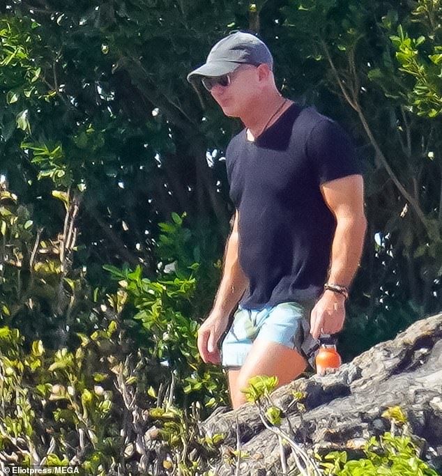 Bezos was dressed in a dark V-neck T-shirt and light blue shorts that revealed his upper thighs during his hike