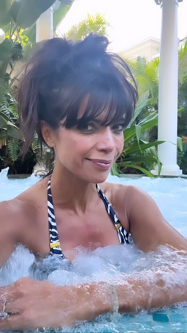 Jenny Powell looked gorgeous in a navy and white striped swimsuit as she enjoyed a hot tub during her luxurious getaway in Tenerife, Spain