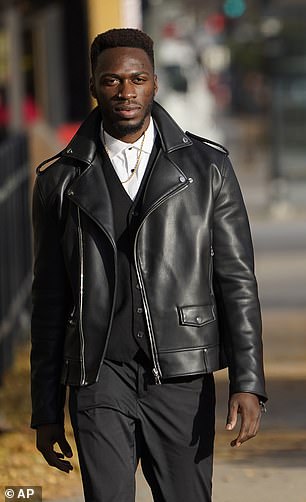 Abimbola, seen outside court with his brother in December 2021, says he feels betrayed by Smollett, who he viewed as 'a brother even after denying the plot