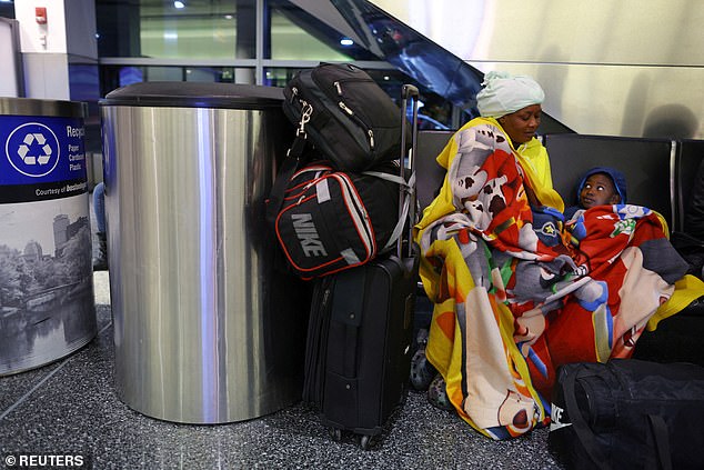 claim area of a terminal at Logan Airport where they were sheltering with other Haitian migrants as all of the shelter beds in the state were full, before being taken to a hotel for one night, paid for by a local non-profit organization, in Boston, Massachusetts last year