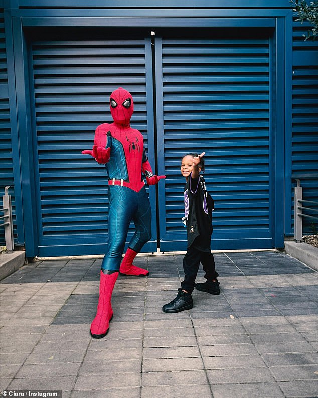 Win was thrilled as he posed with Spiderman