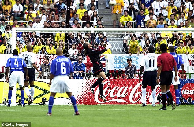 Mills believes Ronaldinho meant to cross it, while Heskey feels the legendary Brazil star meant to score but in the opposite corner to where he did