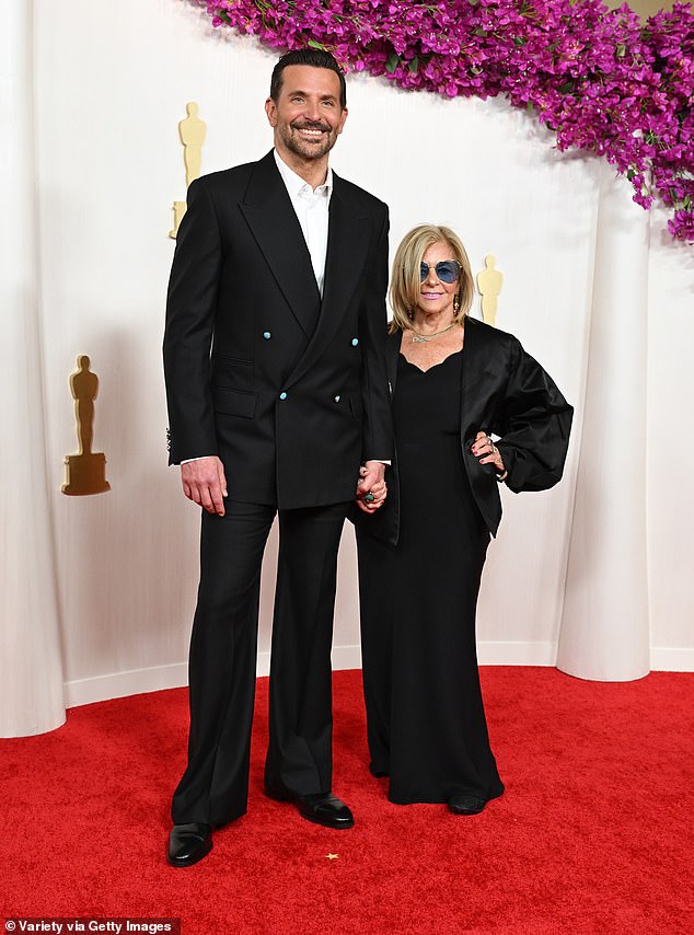 Gigi was not present at Bradley's side at the Oscars, with the Maestro director-writer-star, taking his mother Gloria Campano to the ceremony at the Dolby Theatre; pictured at Oscars