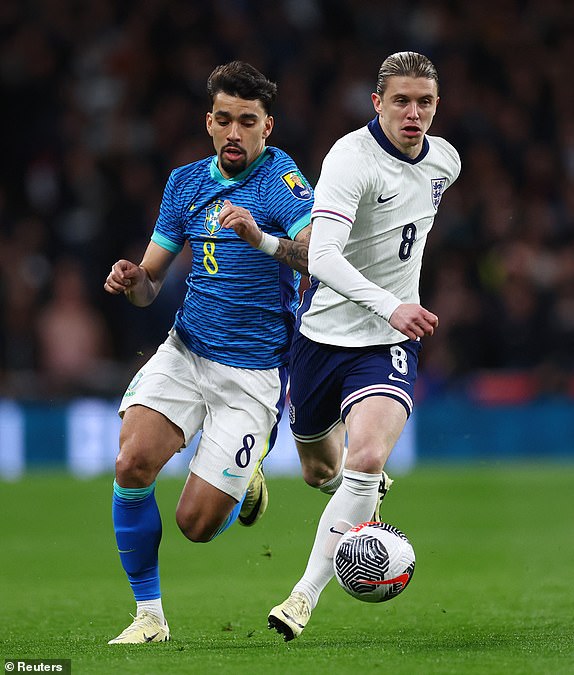 Soccer Football - International Friendly - England v Brazil - Wembley Stadium, London, Britain - March 23, 2024 England's Conor Gallagher in action with Brazil's Lucas Paqueta REUTERS/Carl Recine