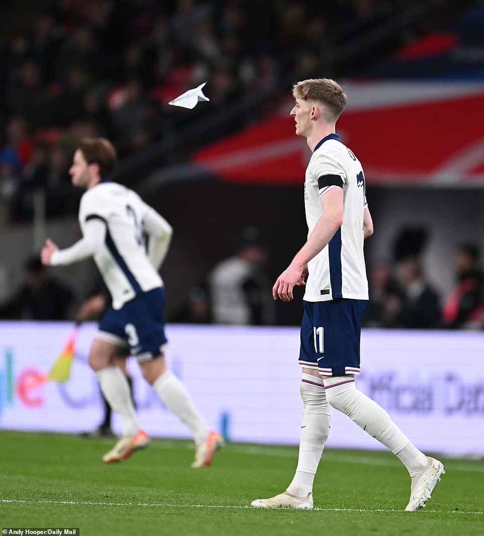 Some fans decided to fly paper airplanes during the game, with one pictured going close to Newcastle star Gordon