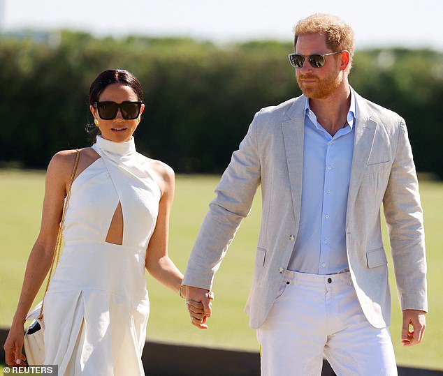 Before changing into his polo attire, Harry opted for a pair of cream trousers, a pale grey jacket, and a crisp blue shirt, while donning some slip-on tan shoes