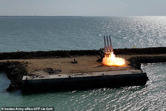 A handout picture provided by the Iranian Army media office on January 19, 2024, shows the launch of a missile during a military drill at an undisclosed location in southern Iran