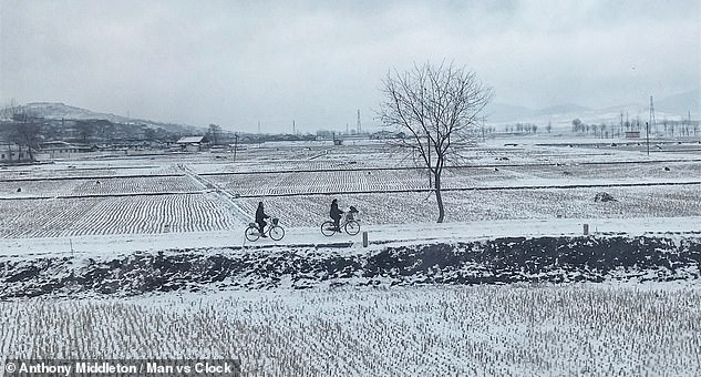 Peering out of the train window, Anthony observed how most locals 'got around on old bicycles' and that some would 'curiously look inside the train sheepishly'