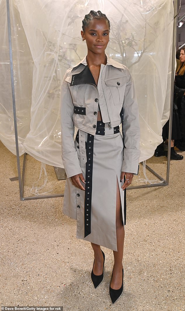 Letitia Wright, 30, looked gorgeous in a dark grey co-ord suit, adorned with a racy thigh-high split in the skirt