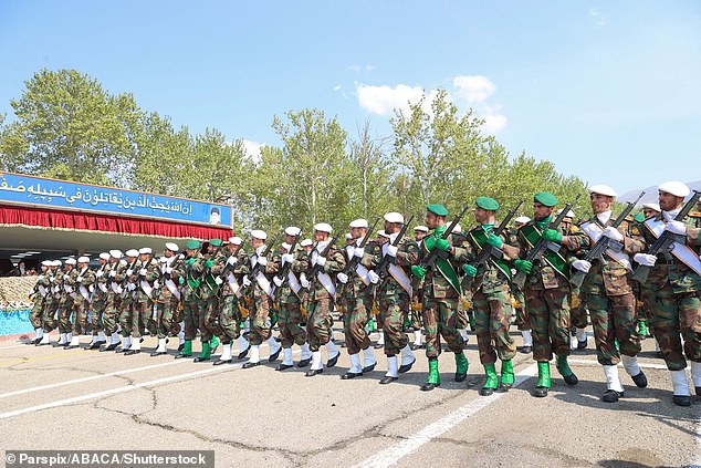 Iranian soldiers take part in a military parade during a ceremony marking the country's annual army day in Tehran on April 17, 2024