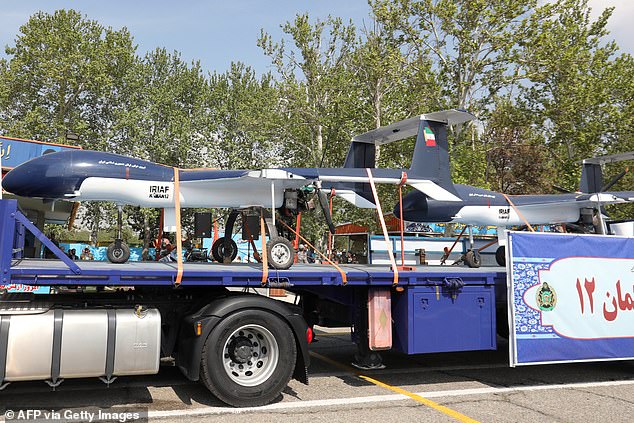 An Iranian military truck carries Kaman 12 drones during a military parade as part of a ceremony marking the country's annual army day in the capital Tehran on April 17, 2024