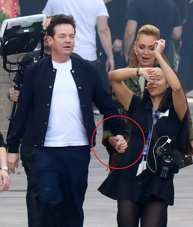 Josie Gibson has admitted she is terrified of having her heart broken - just days after being pictured holding hands with her 'love' Stephen Mulhern (the duo pictured holding hands on Saturday)