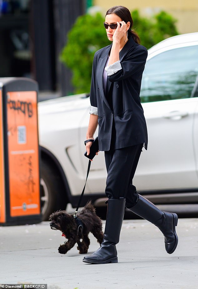 The Russian supermodel, 38, wore an oversized black blazer with a white shirt underneath and black pants