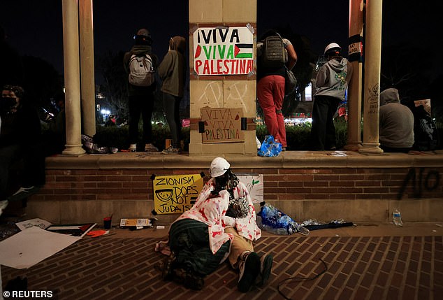 Pro-Palestinian protesters resting close to the protest encampment