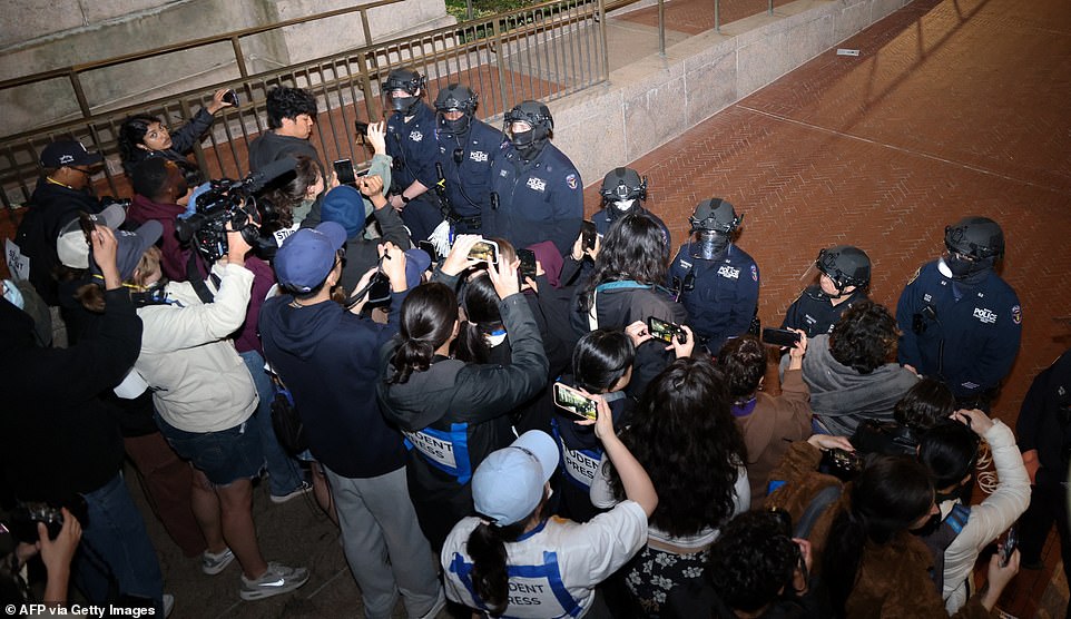 Pro-Palestine protestors fortified their barricades and prepared for clashes as hundreds of LAPD flooded the UCLA campus Wednesday night, the second night in a row encampments on the California campus turned physical. It comes as police are cracking down on encampments at campuses across America. There were arrests made on campuses such as Ivy League's Dartmouth in Rhode Island, the University of Texas at Dallas, and the University of Wisconsin at Madison. At Wisconsin, more than 34 were arrested and some cops were hurt in clashes.