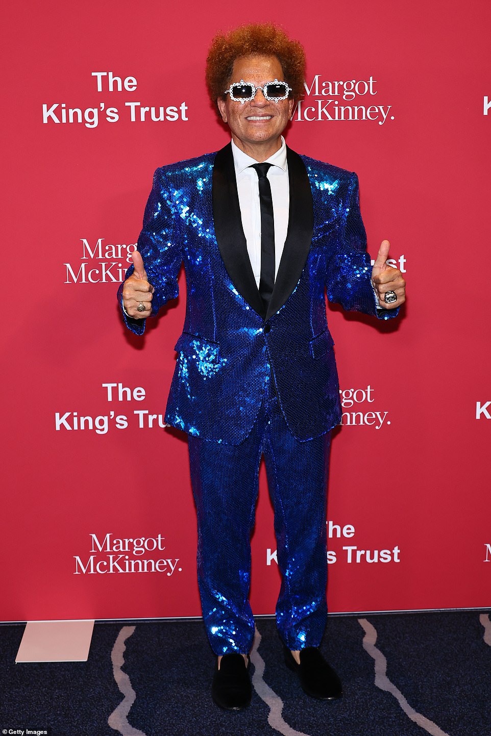 Romero Britto, 60, wore a bright blue sequin suit for the occasion