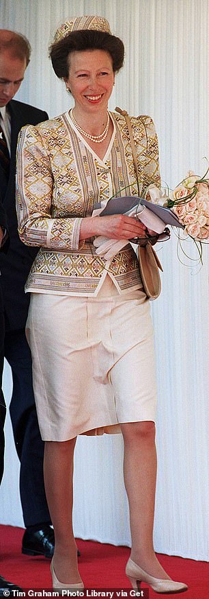 This skirt suit was a mainstay in Princess Anne's 90s wardrobe. Above: Anne wearing it at a VE Day commemoration in Hyde Park in 1995