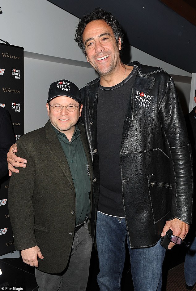 Jason Alexander (L) and Garrett arrive at Pokerstars.net's Celebrity Charity Poker Tournament at Venetian Hotel in 2010 in Las Vegas