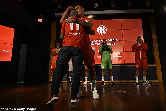 His son, Romarinho, hugged Romario after the Brazil legend revealed they will play together