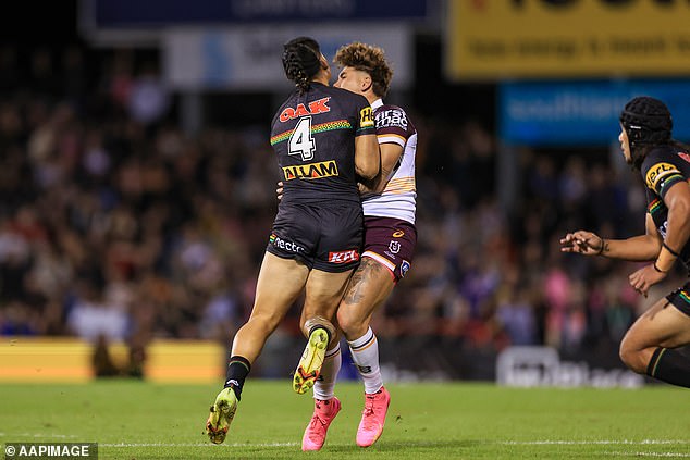 May also provided a major talking point with footy fans in March following this hit on Broncos fullback Reece Walsh (pictured)