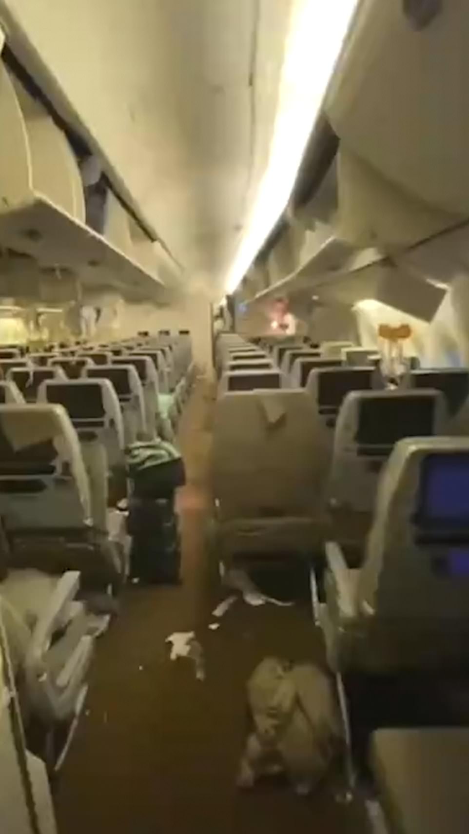 Luggage came crashing out of the overhead lockers, slamming onto people's heads below, while loose objects like water bottles, food trays and cutlery were thrown about like missiles. As the pilots fought to regain control of the aircraft oxygen masks fell from the overhead compartments into the laps of terrified passengers. The aircraft carrying more than 200 people dropped hundreds of feet in the space of 90 seconds.