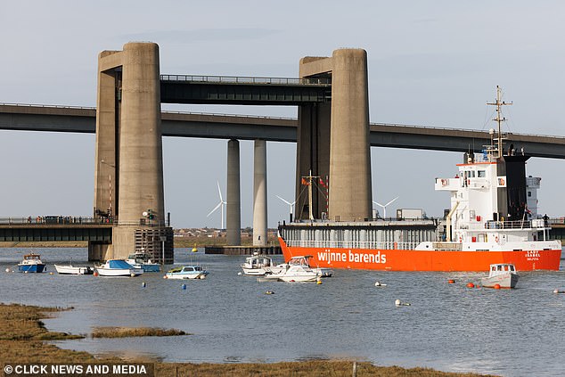 The Kingsferry Bridge serves dually as a road and railway bridge that links the Isle of Sheppey to mainland Kent