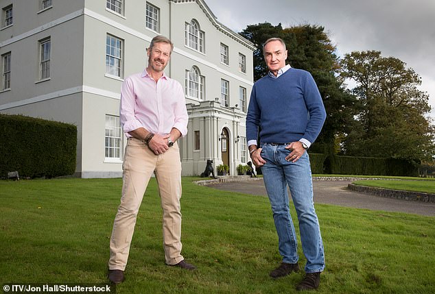 Lord Mountbatten and his husband, James Coyle, a Glaswegian air cabin services director, intend to remain at the property, come what may. Pictured: The couple outside the property in 2021