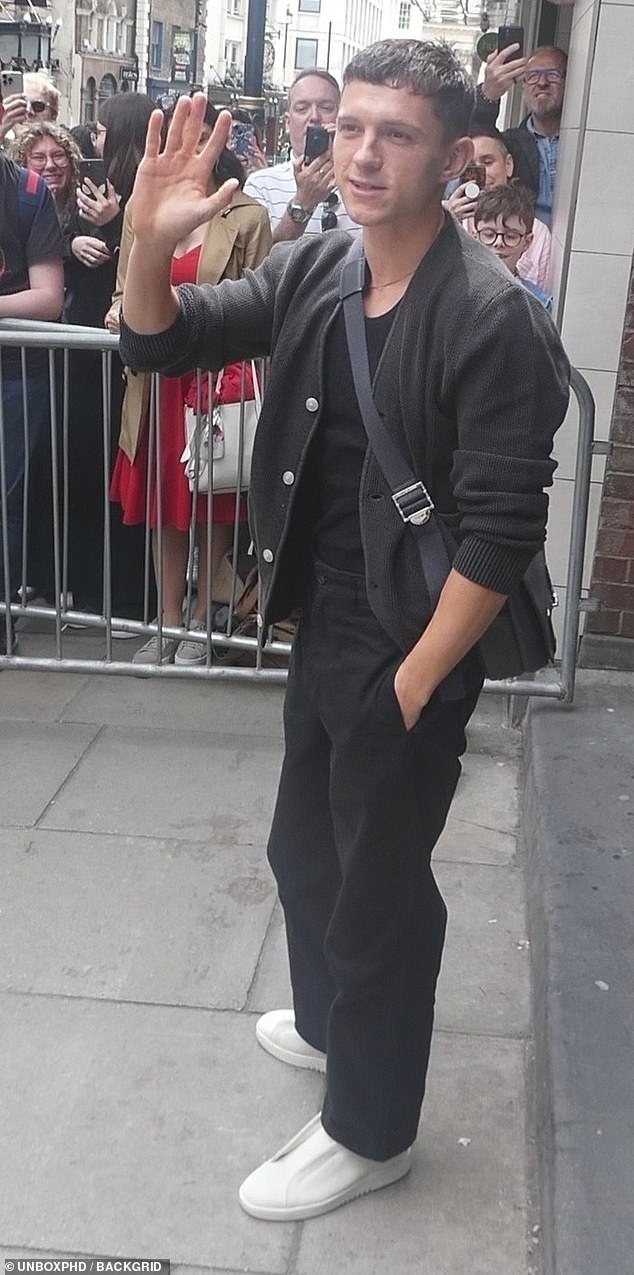 Tom Holland looked radiant as he arrived at the Duke Of York's Theatre ahead of his latest Romeo & Juliet performance on Saturday