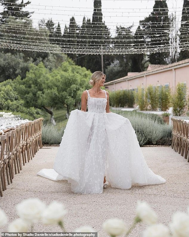 Anna, 32, looked gorgeous in a Alin Le' Kal wedding dress from the Melbourne couture designer