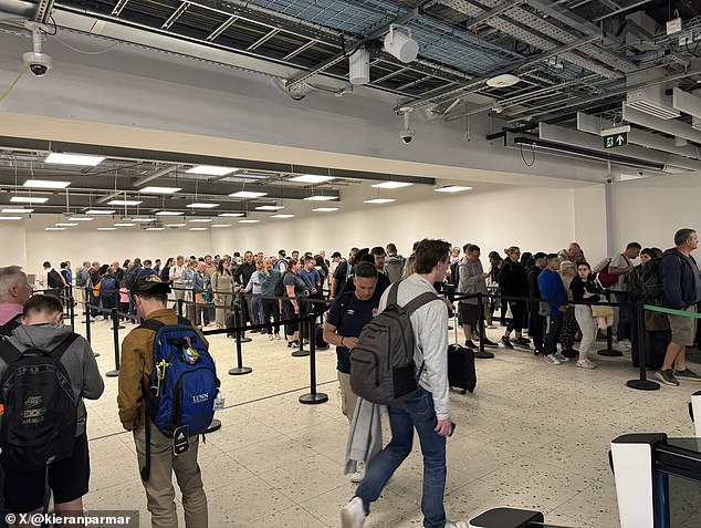 Passengers reported having to wait for more than an hour at Birmingham Airport last night
