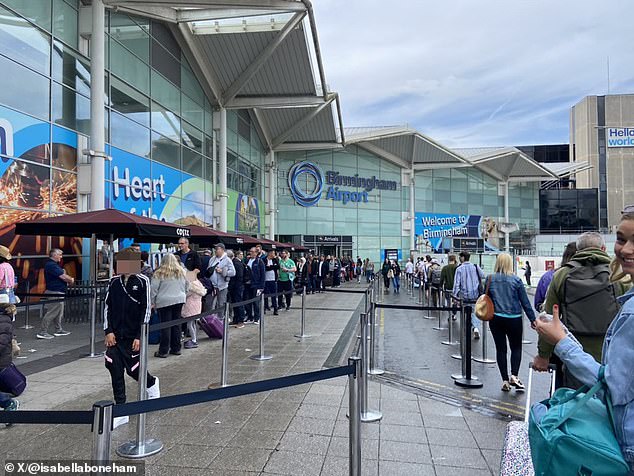 Thousands of Britons were stuck in queues for hours at Birmingham Airport yesterday