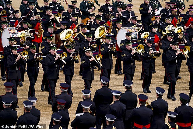 Troops of the Household Division take part in the Brigade Major's Review in London yesterday