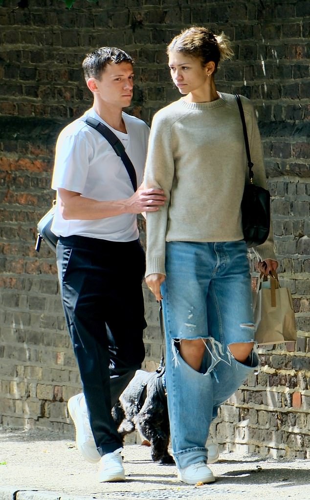 The Hollywood actress, 27, is deemed to wear the trousers in their romance judging by her behaviour while out on a walk with the actor, also 27, in Richmond this week