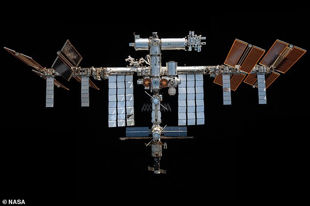 Destination: Underside view of the International Space Station (ISS) in November 2021, which maintains an orbit approximately 250 miles (400 kilometers) above Earth