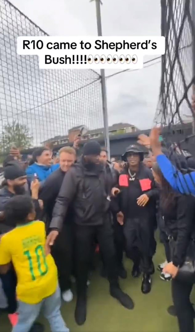 Stunned spectators recorded videos of Ronaldinho being escorted through a large crowd